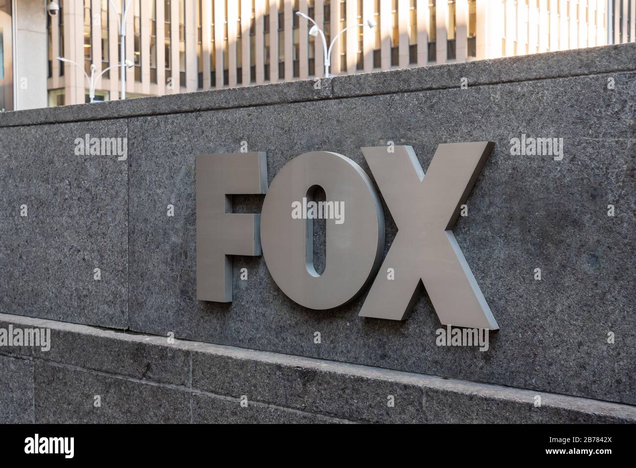 A view of an american conservative cable television news channel Fox News logo. Stock Photo