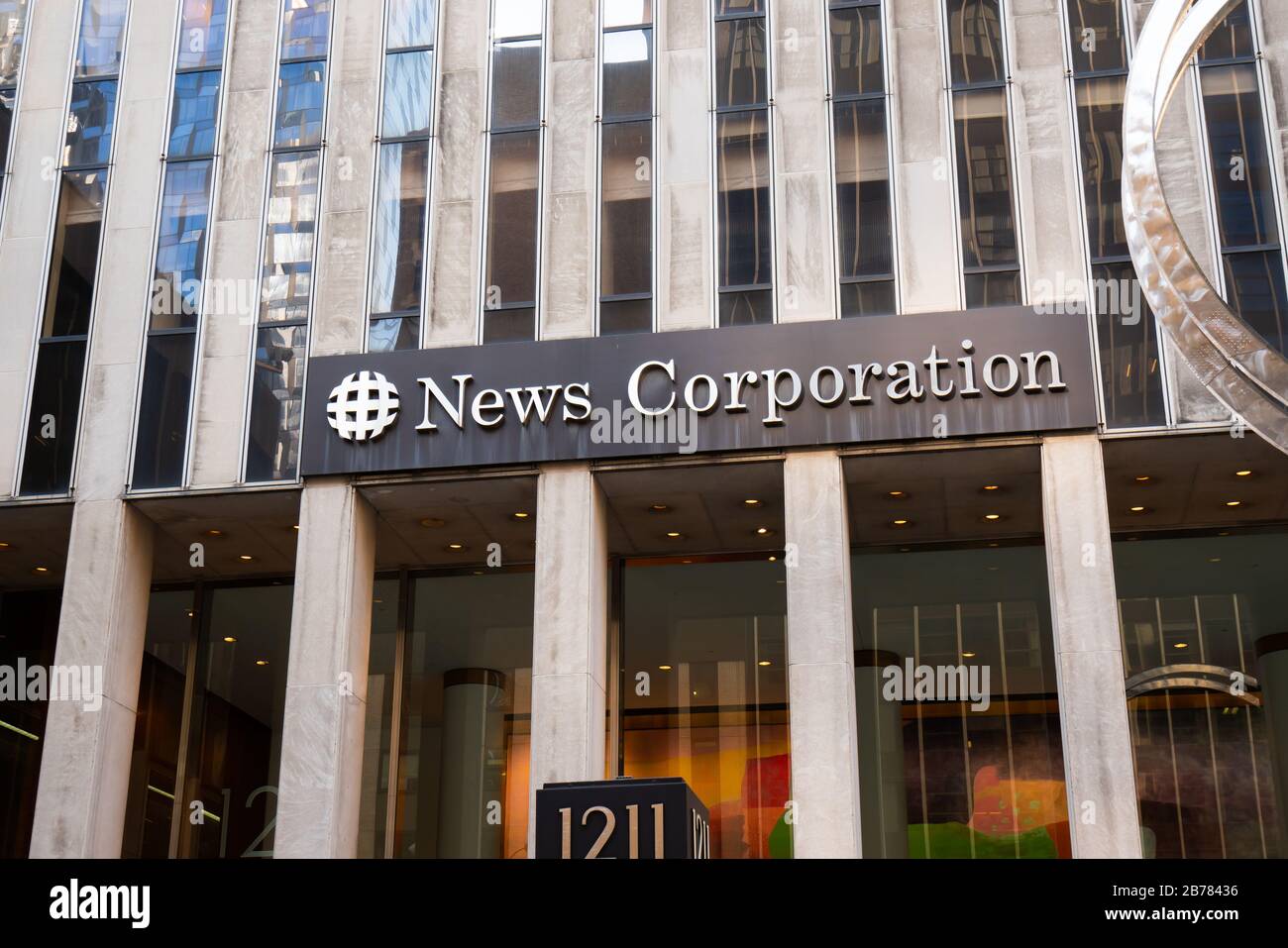 American mass media and publishing company News Corporation logo seen on a building. Stock Photo