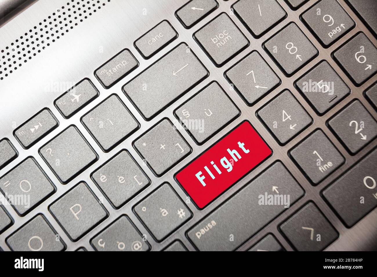 Red button on the computer with the text Flight Stock Photo