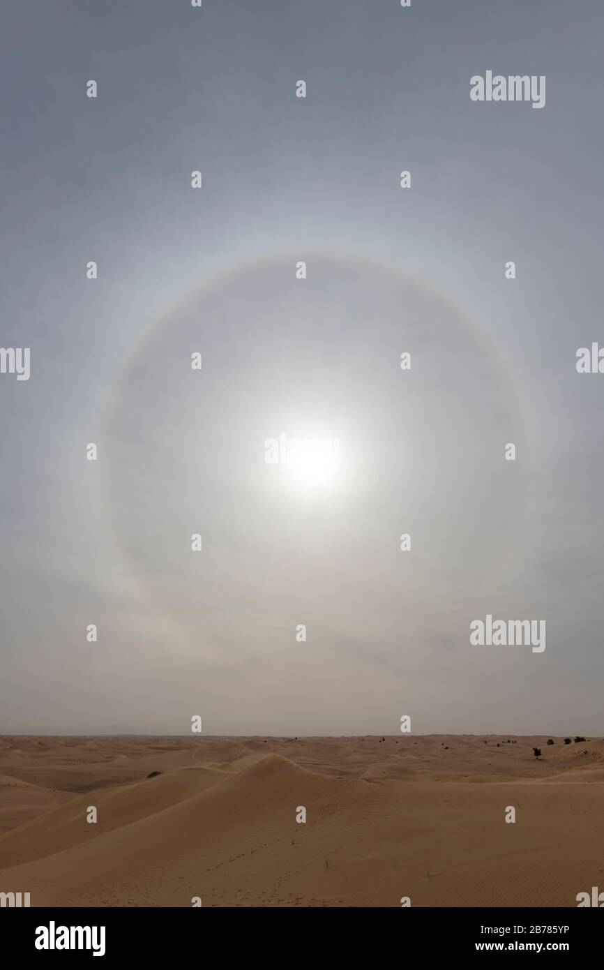 circular halo around the Sun observed in the desert Stock Photo