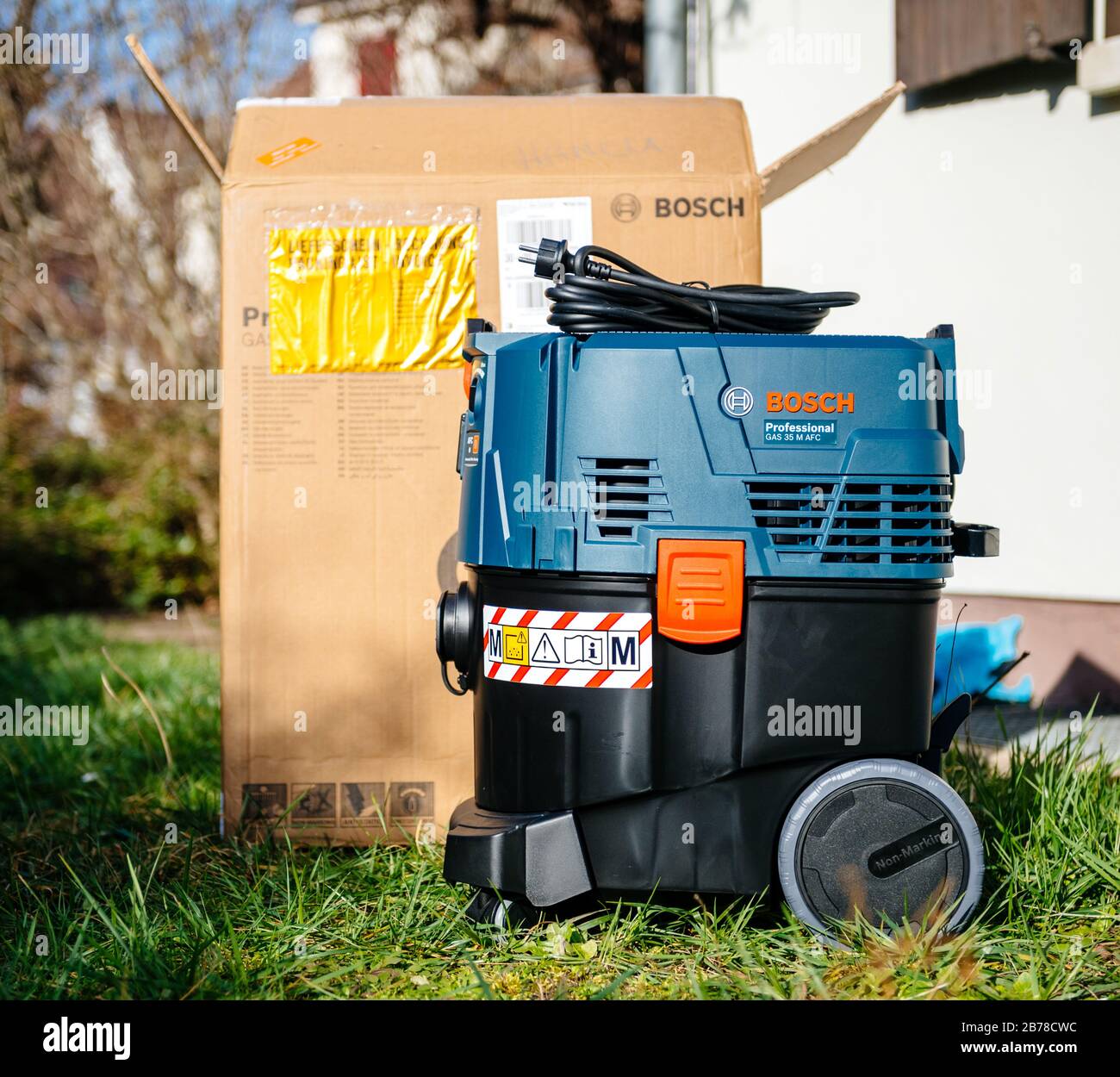 Strasbourg, France - Feb 9, 2020: New professional Bosch GAS 35 M AFC Wet  Dry Vacuum Cleaner on green grass near reconstructed home - M filter class  Stock Photo - Alamy