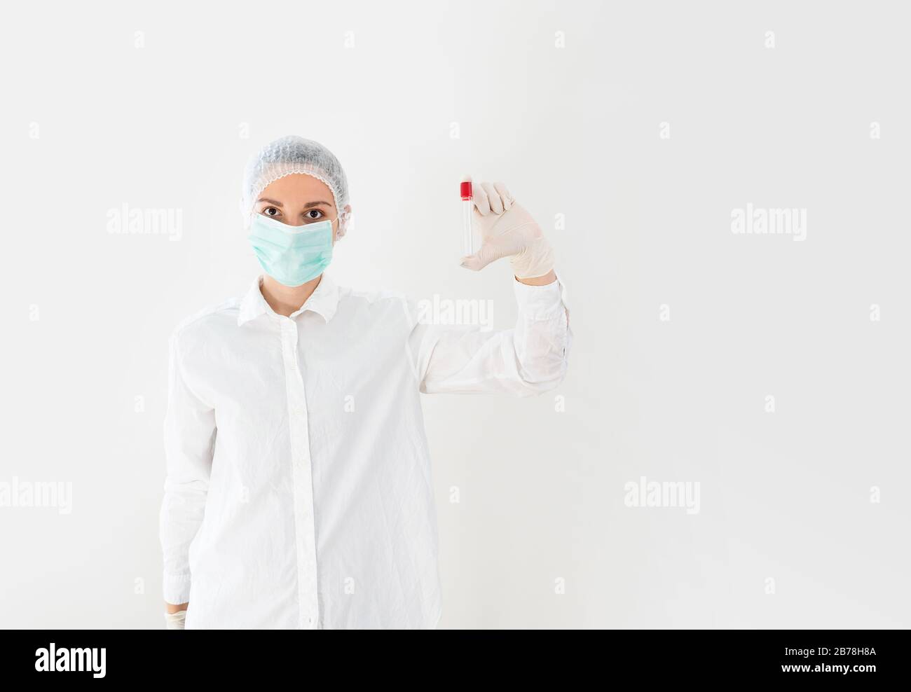 Doctor in laboratory doing text in tube. Virology. Expirement Stock Photo Alamy