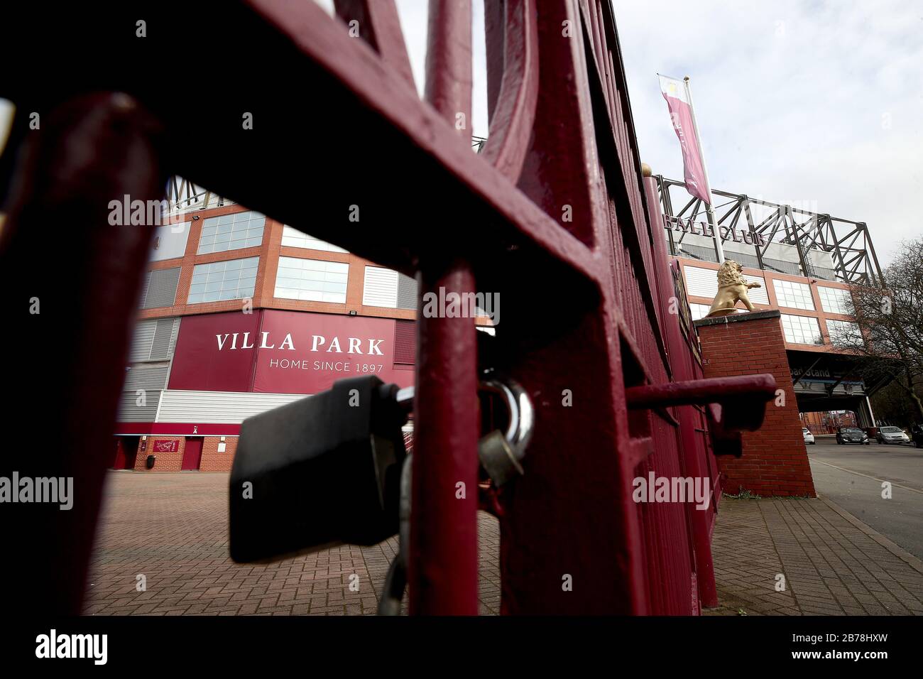 A general view of the stadium behind locked gates at Villa Park, home of Aston Villa Football Club, following yesterday's announcement that the Premier League has suspended all matches until Saturday April 4, 2020. Stock Photo