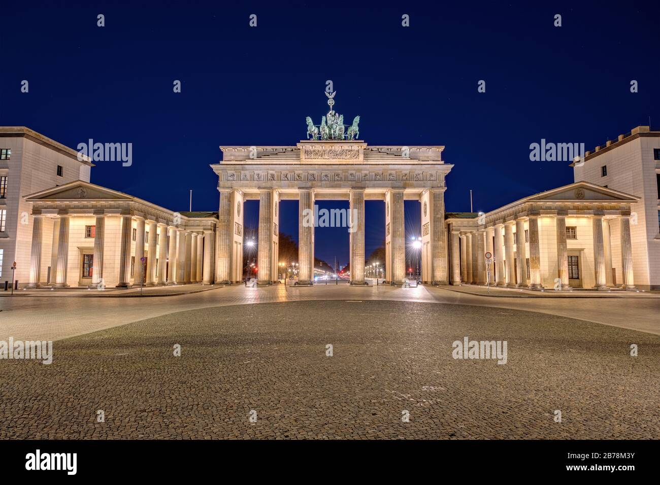 The Brandenburg Gate in Berlin at night Stock Photo