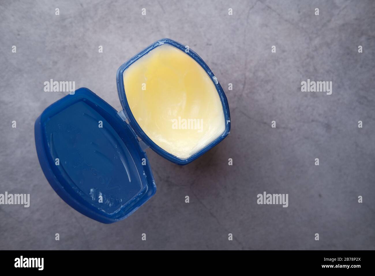 a container with cream oil petroleum jelly Stock Photo Alamy