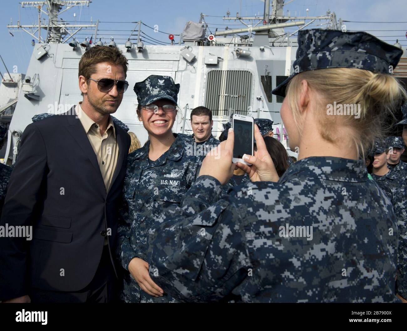 Gerard Butler with Navy soldier Stock Photo - Alamy