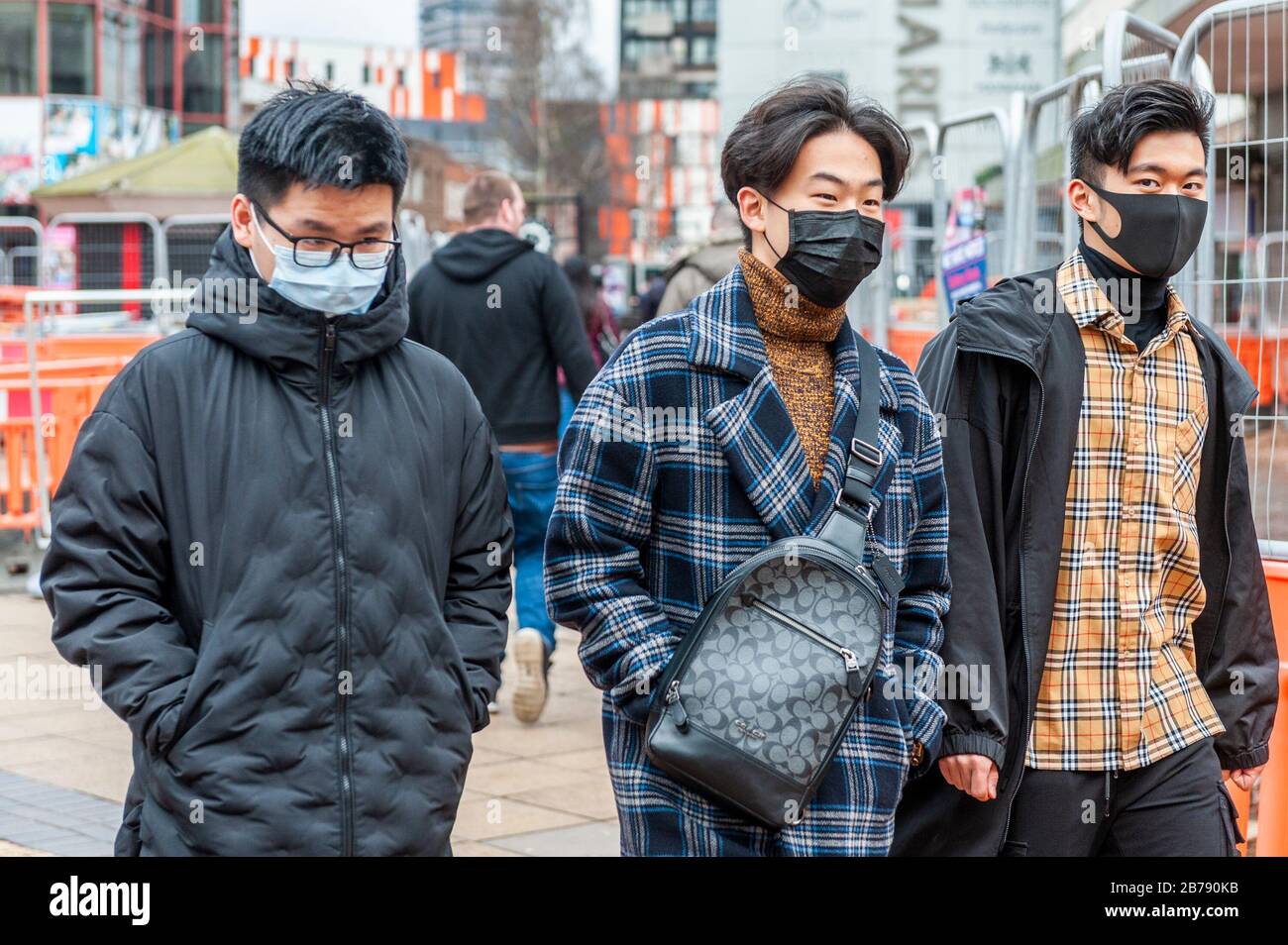 Coventry, West Midlands, UK. 14th Mar, 2020. The Coronavirus pandemic forced shoppers to wear protective masks in a virtually deserted Coventry city centre this morning. Credit: Andy Gibson/Alamy Live News Stock Photo