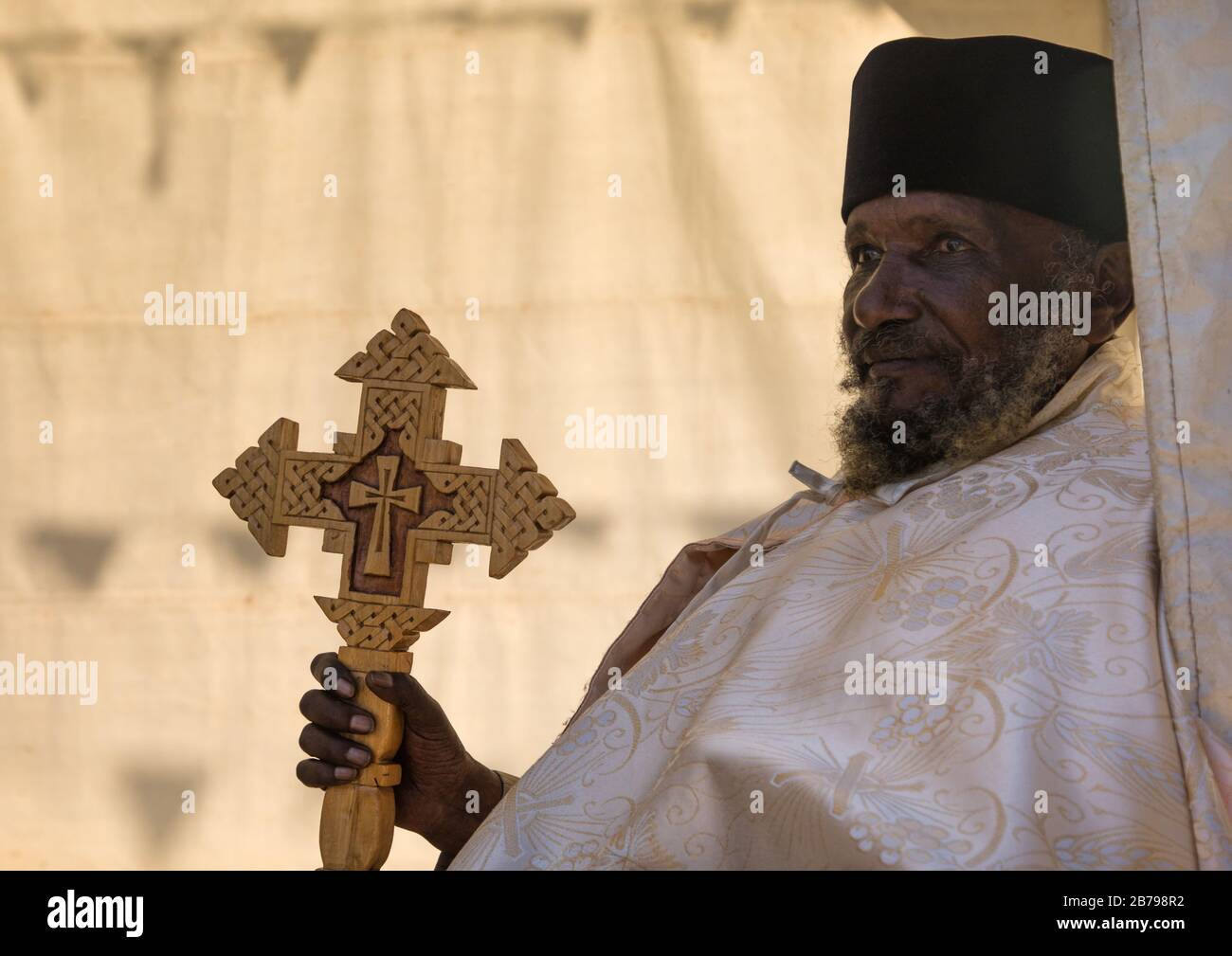 Priest with a cross in Entoto orthodox Maryam Church, Addis Ababa Region, Addis Ababa, Ethiopia Stock Photo