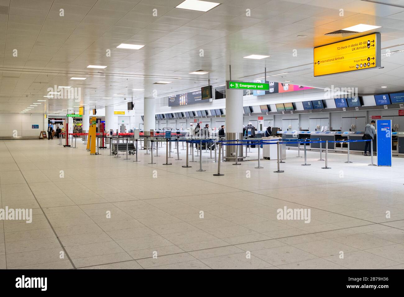 very quiet Glasgow airport check- in desks - mid afternoon March 5 2020, the day after the collapse of Flybe Stock Photo