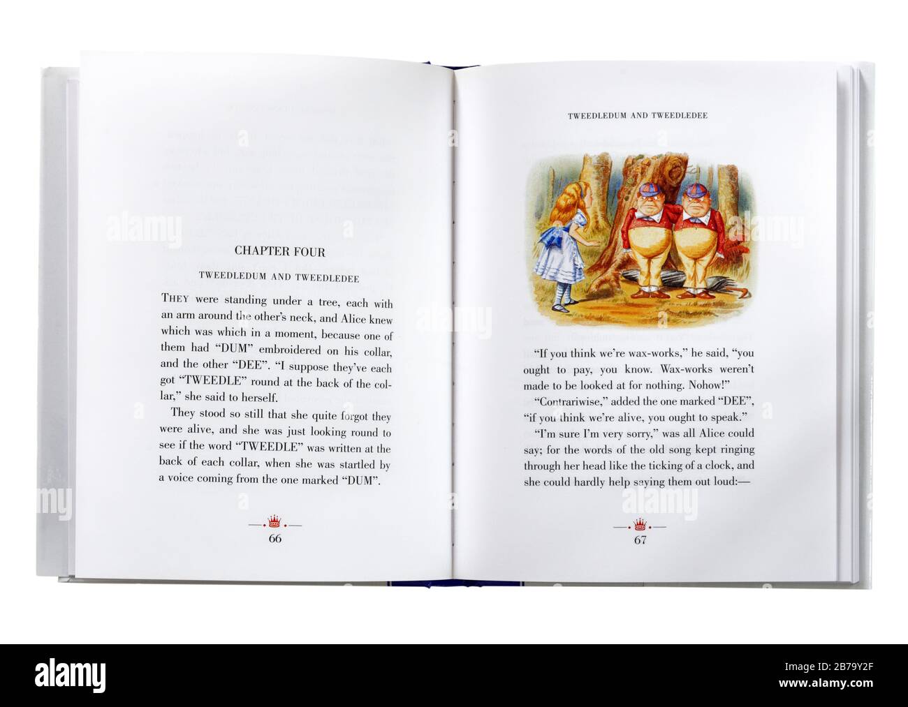 Alice Through the Looking Glass by Lewis Carroll, open at an illustration of Alice and the Tweedledum and Tweedledee Stock Photo