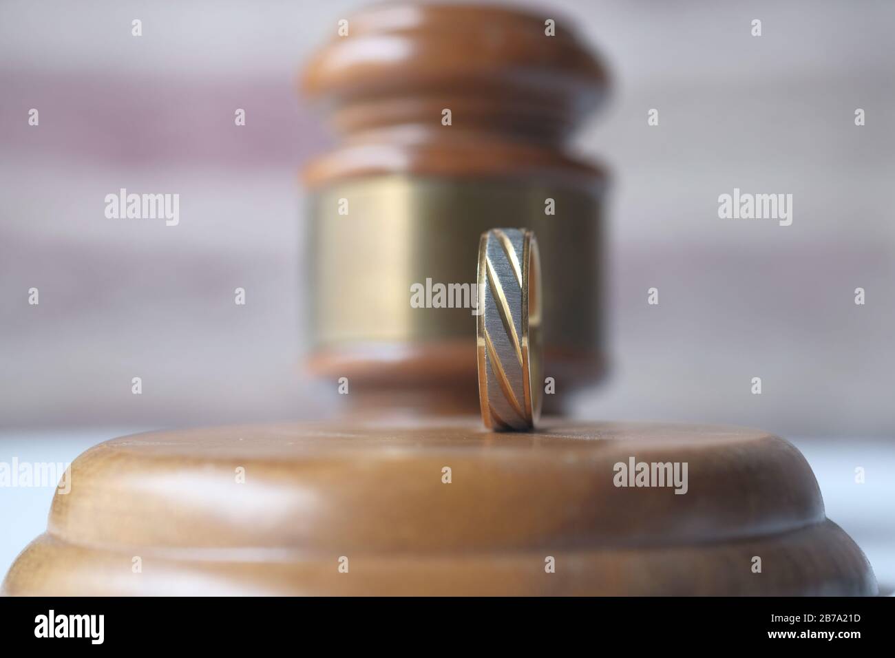 Divorce concept with gavel and wedding rings Stock Photo Alamy