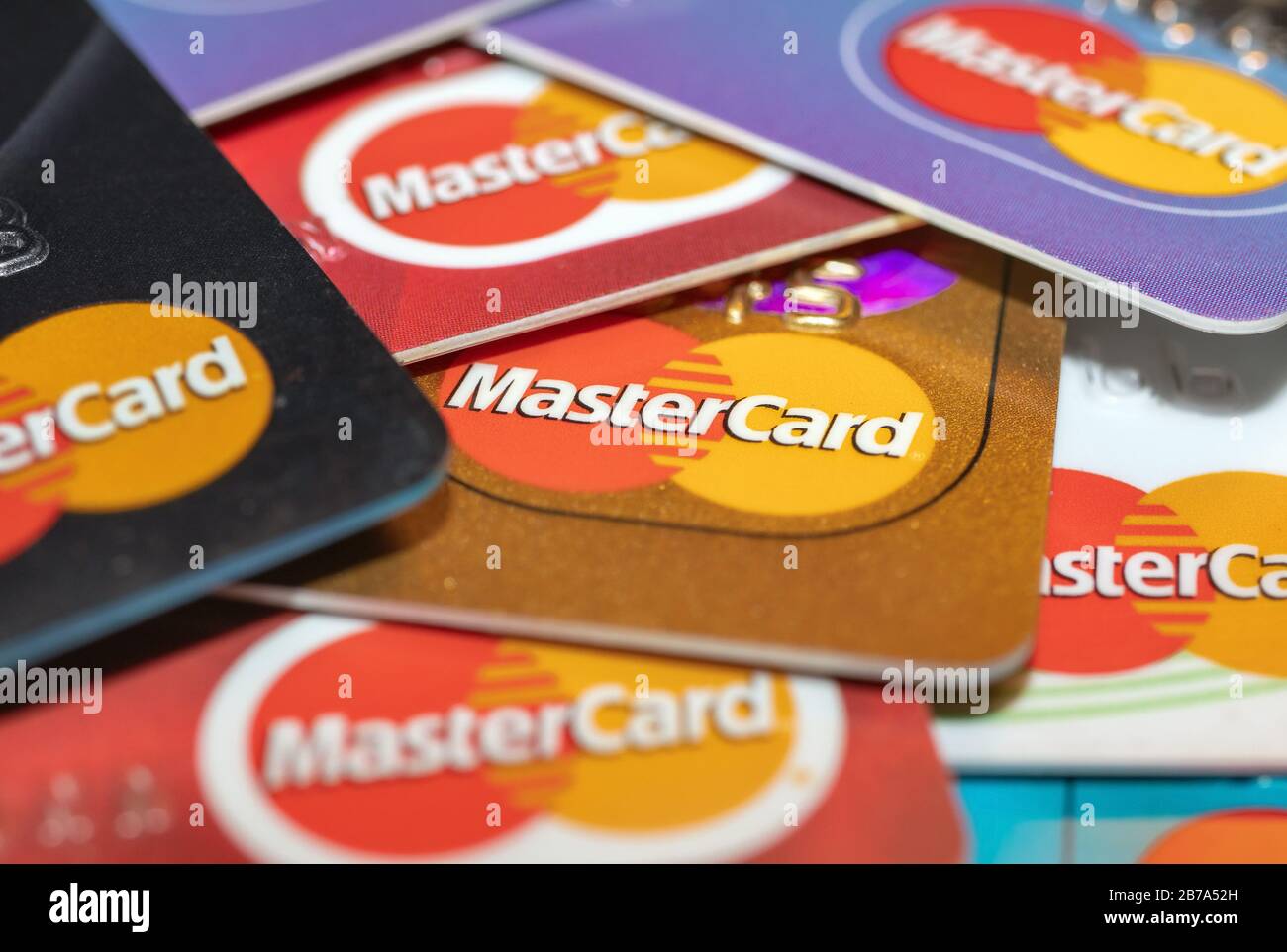 London / UK - March 6th 2020  - Pile of Mastercard bank cards, closeup macro view with a shallow depth of field Stock Photo