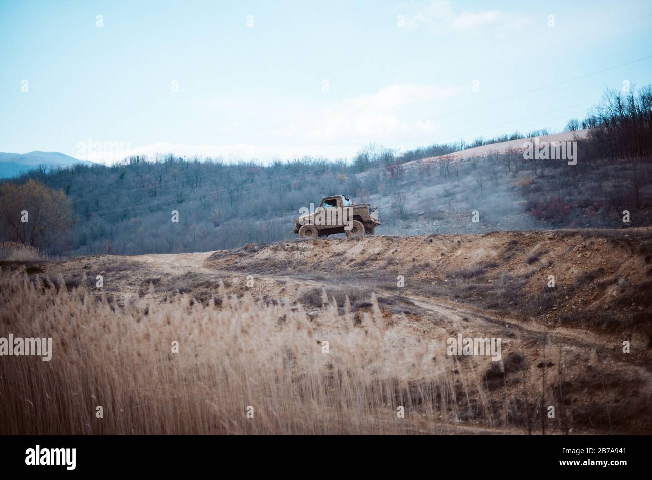Jeep on the hill. Offroad activity poster Stock Photo