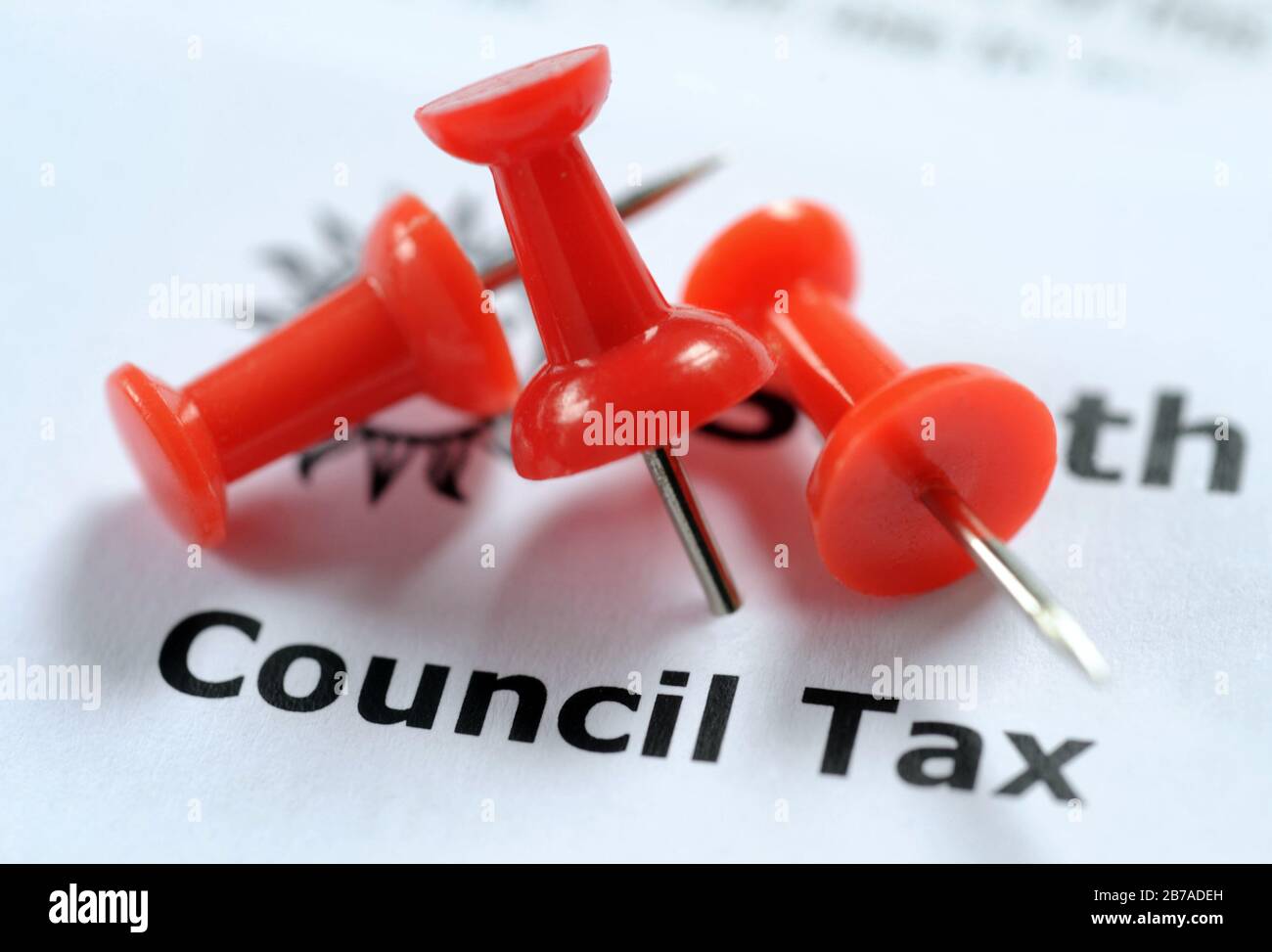 COUNCIL TAX BILL WITH NOTICE BOARD PINS RE PAYMENT HOUSEHOLD BILLS BAND BANDS ETC UK Stock Photo