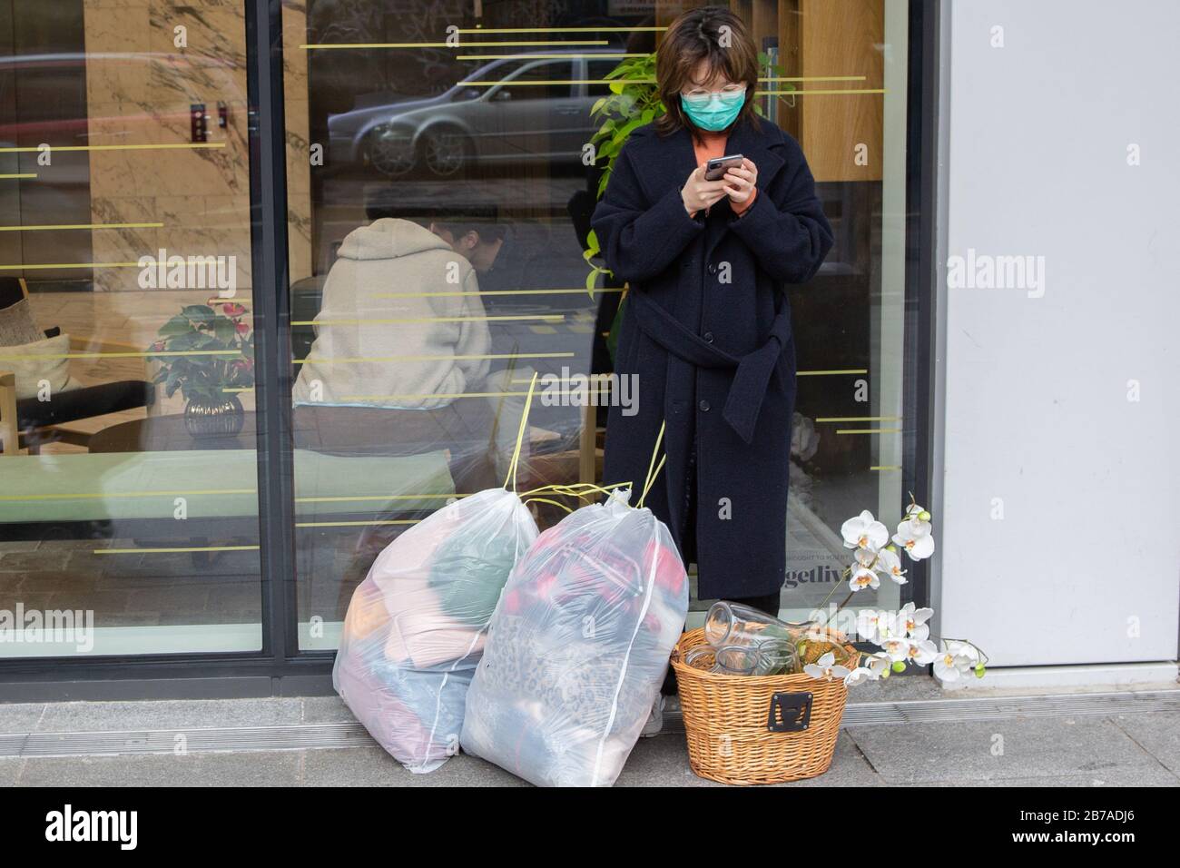 London UK 14th March 2020 A Woman wearing a mouth mask to protect herself during the Coronavirus outbreak in London. Credit: Thabo Jaiyesimi/Alamy Live News Credit: Thabo Jaiyesimi/Alamy Live News Stock Photo
