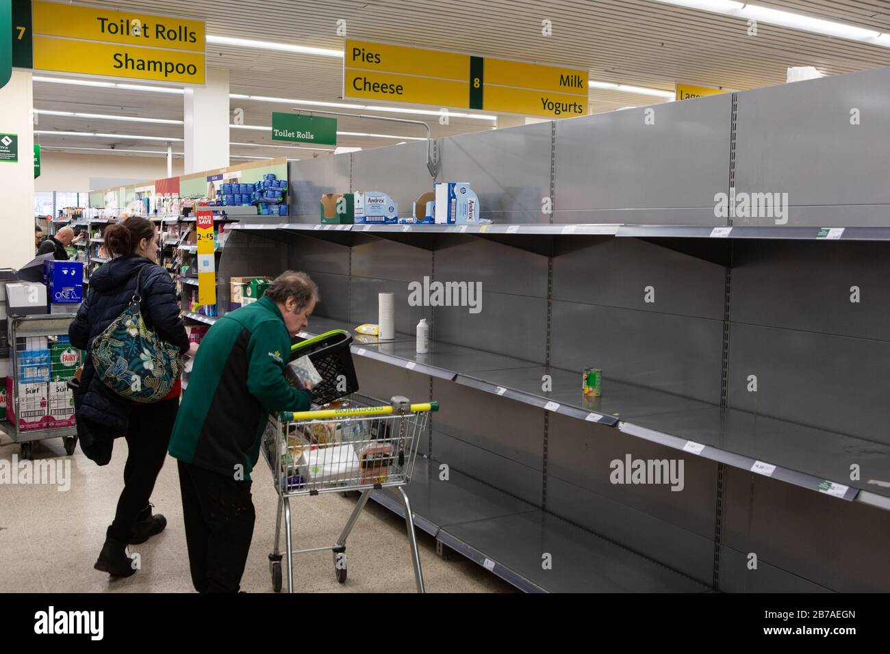 London UK 14th March 2020 Shoppers are confronted with empty shelves at a supermarket in  South London as people take precaution against the continued spread of Coronavirus in London. Stock Photo