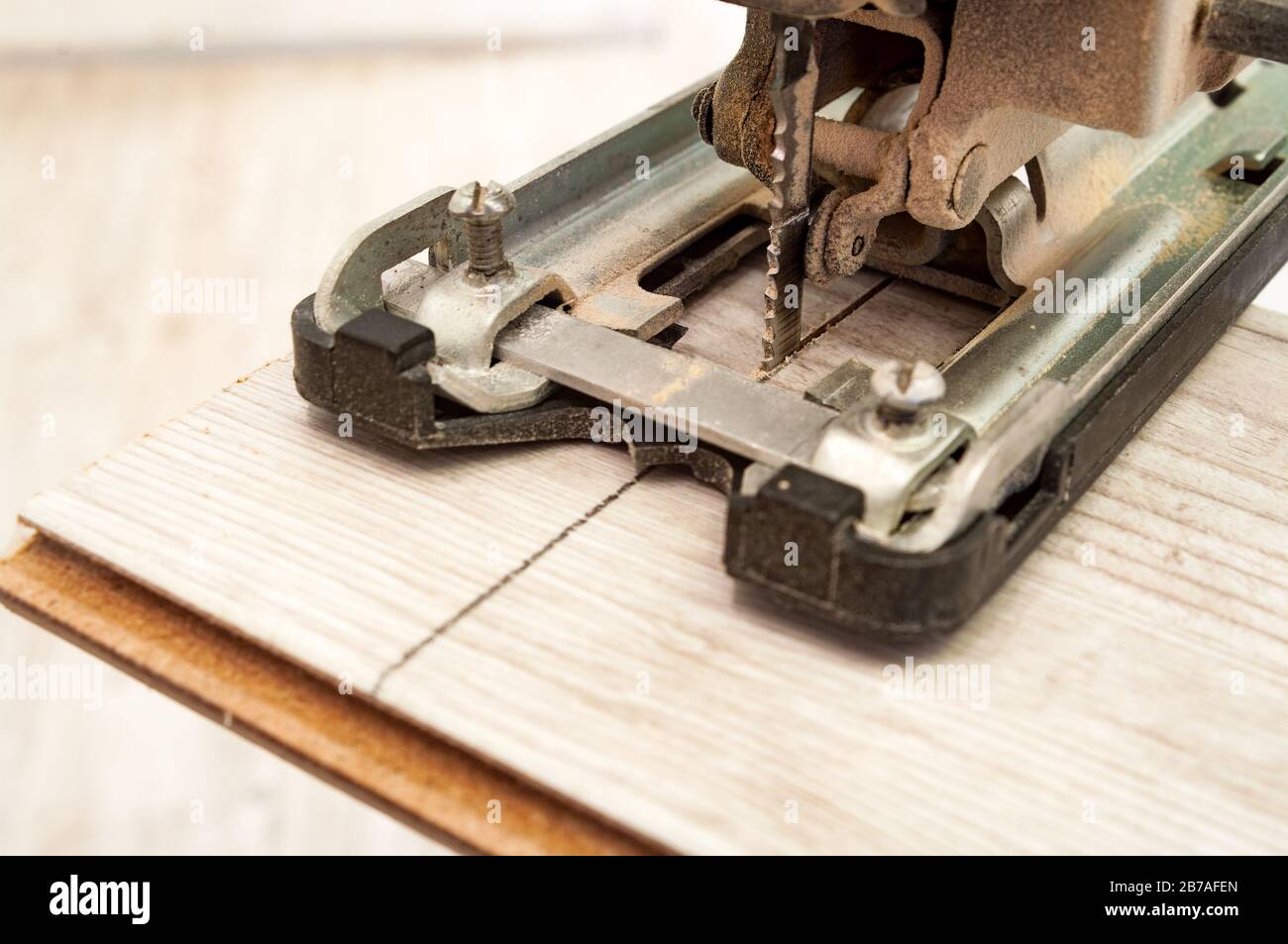 Electric jigsaw at work. Closeup Stock Photo Alamy