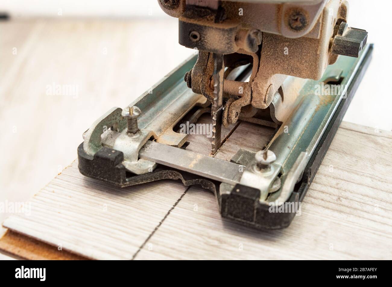 Electric jigsaw at work. Closeup Stock Photo Alamy