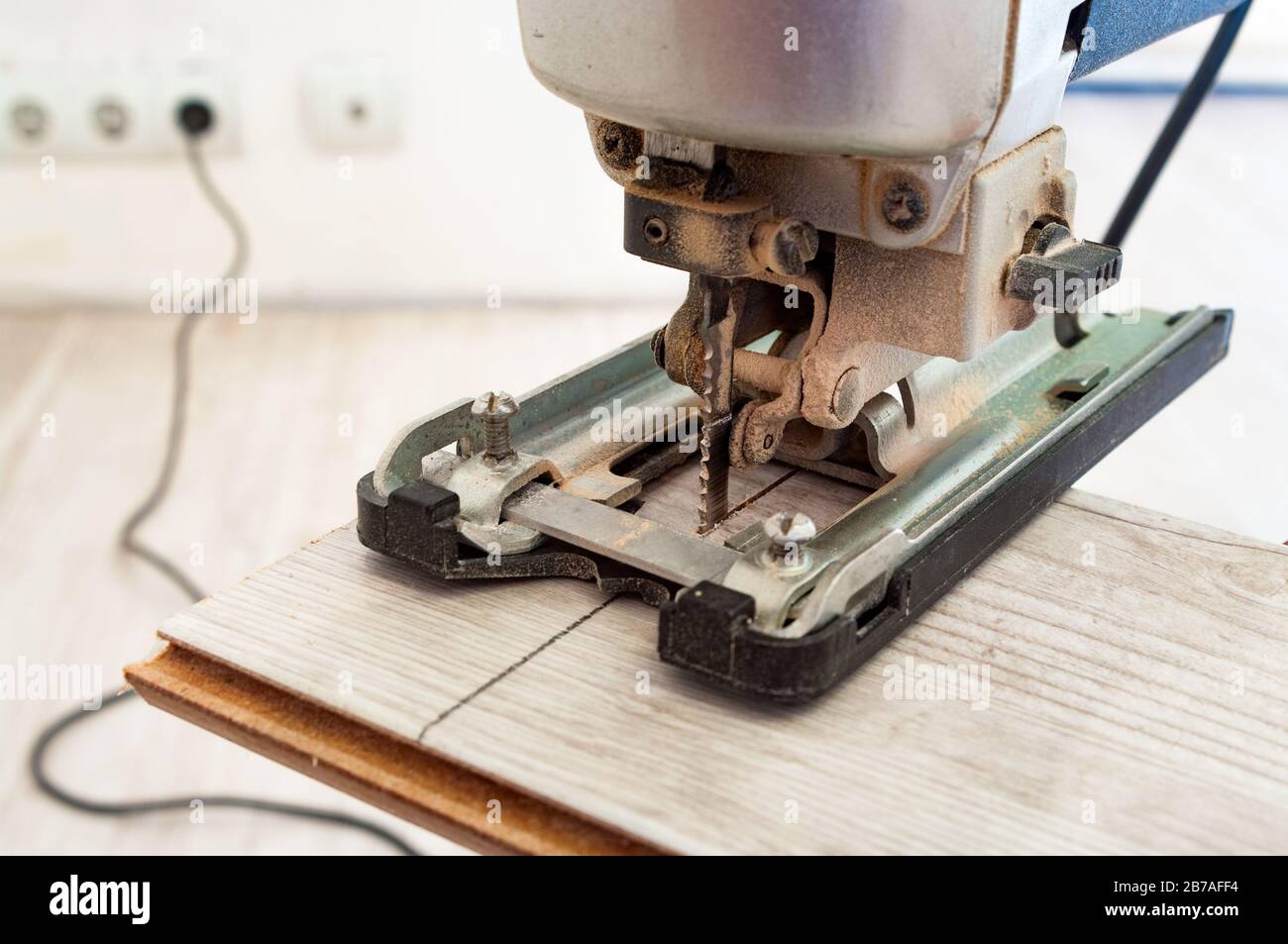 Electric jigsaw at work. Closeup Stock Photo Alamy