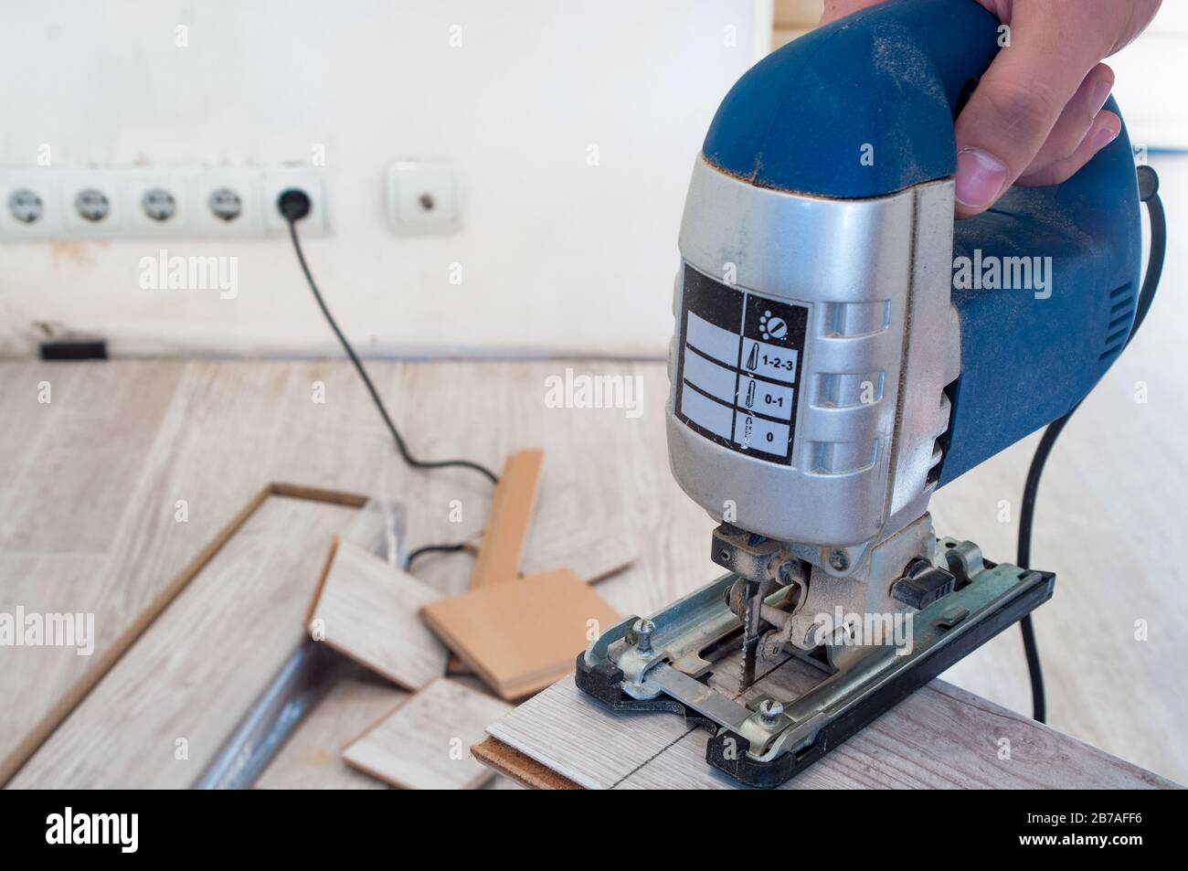 Electric jigsaw at work. Closeup Stock Photo Alamy