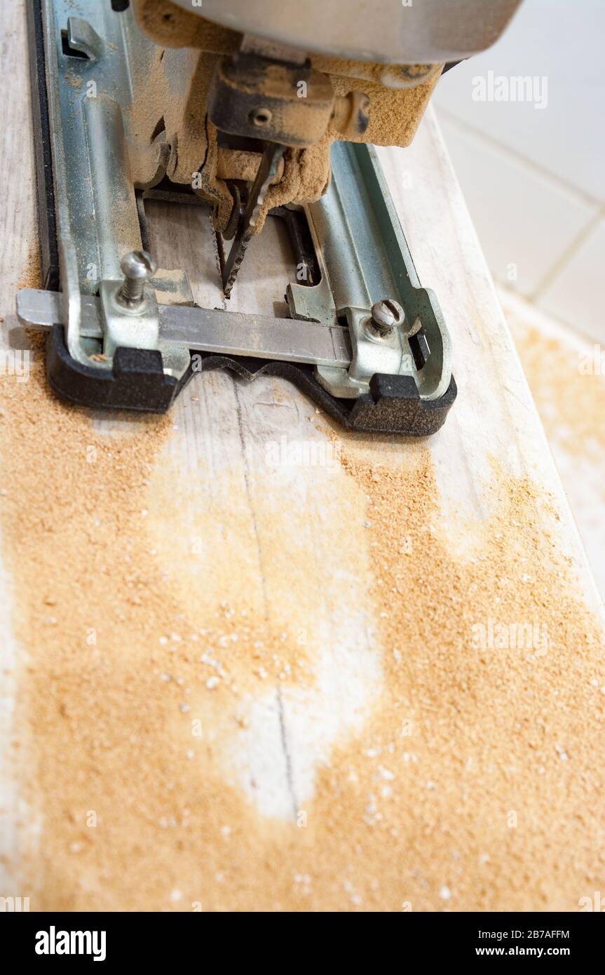 Electric jigsaw at work. Closeup Stock Photo Alamy