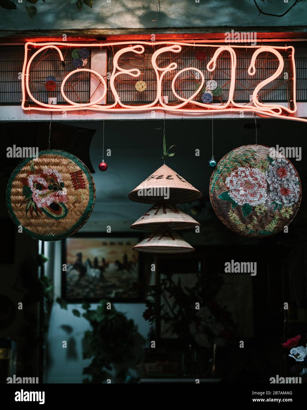 Neon sign spelling Coffee outside a shop in Hanoi, Vietnam Stock Photo
