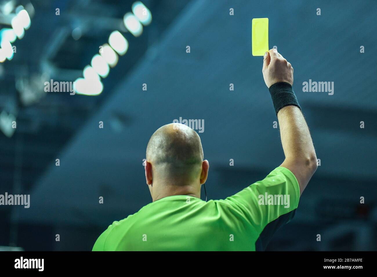 Referee shows yellow card during handball match Stock Photo Alamy