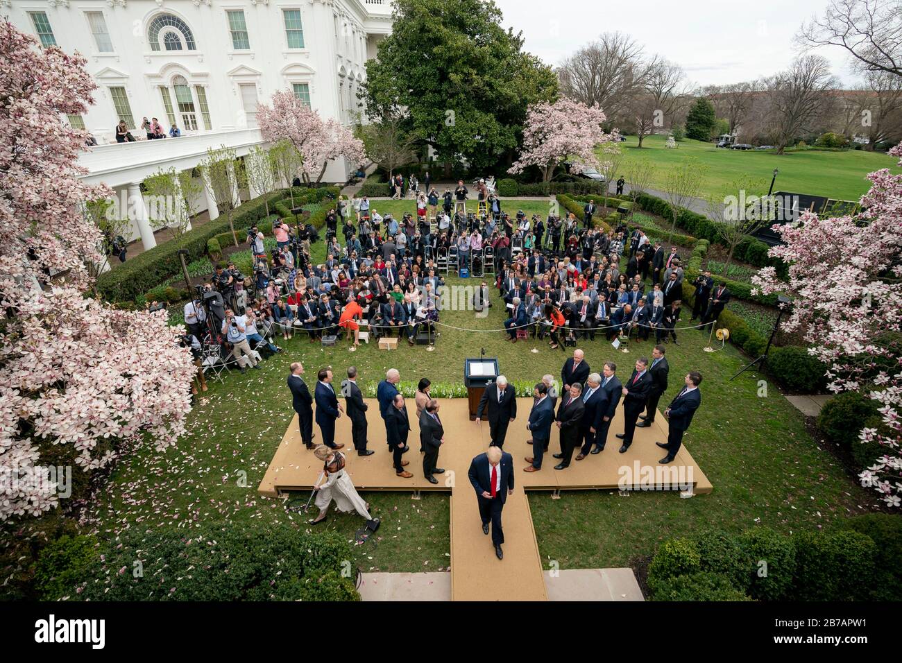 Washington, United States Of America. 13th Mar, 2020. Washington, United States of America. 13 March, 2020. U.S President Donald Trump walks back to the Oval Office following an announcement of a national emergency to combat the coronavirus outbreak in the Rose Garden of the White House March 13, 2020 in Washington, DC. Credit: Tia Dufour/White House Photo/Alamy Live News Stock Photo