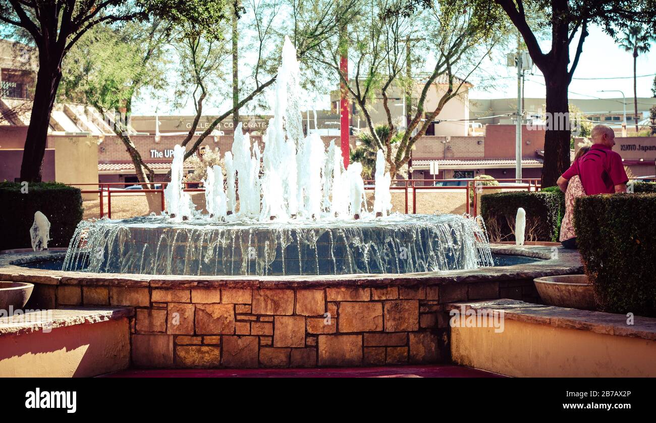 A relaxing and shady area with water fountain feature along the AZ