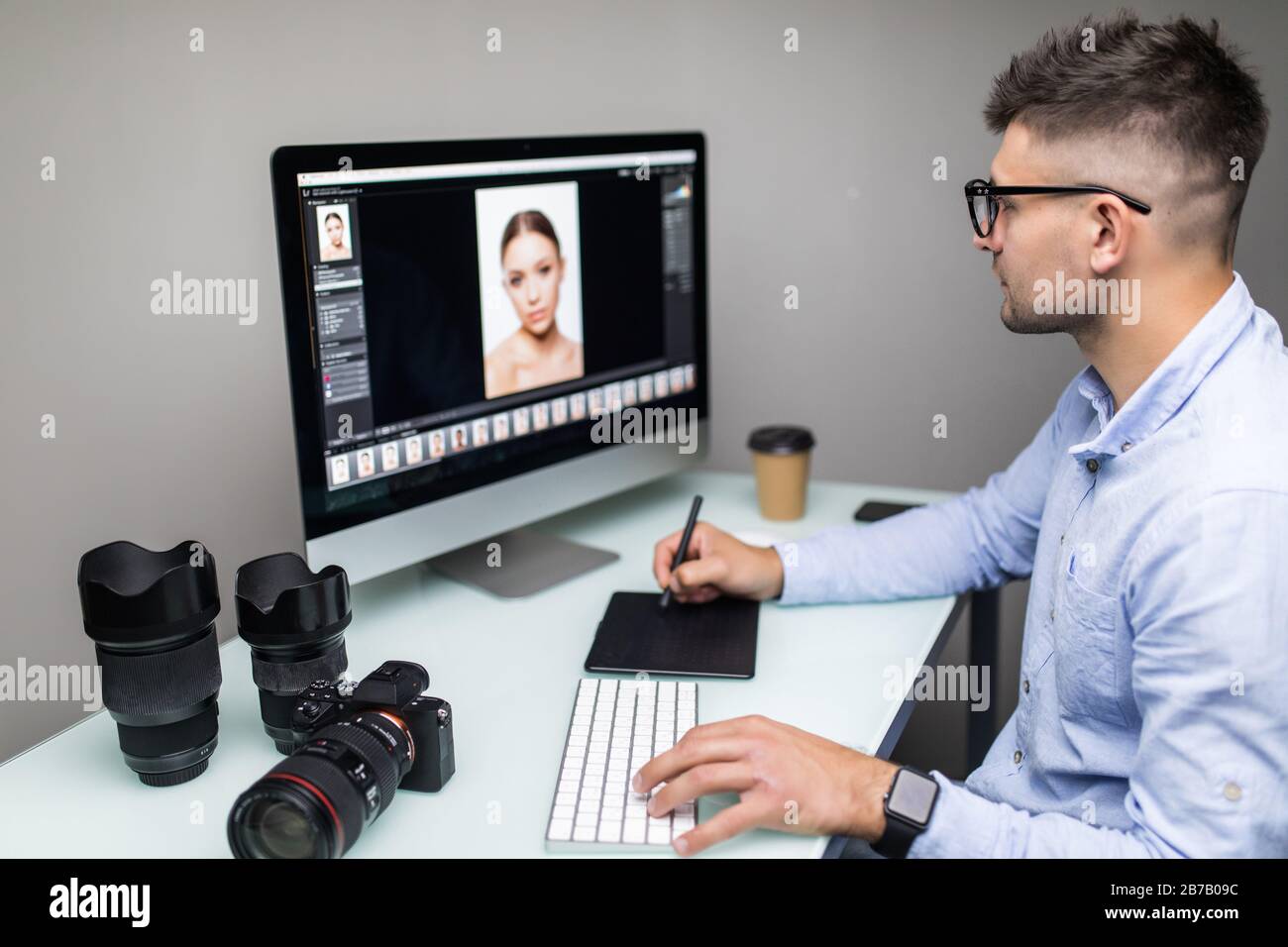 Person Using Graphics Tablet Male artist using black tablet hi-res stock photography and images - Alamy