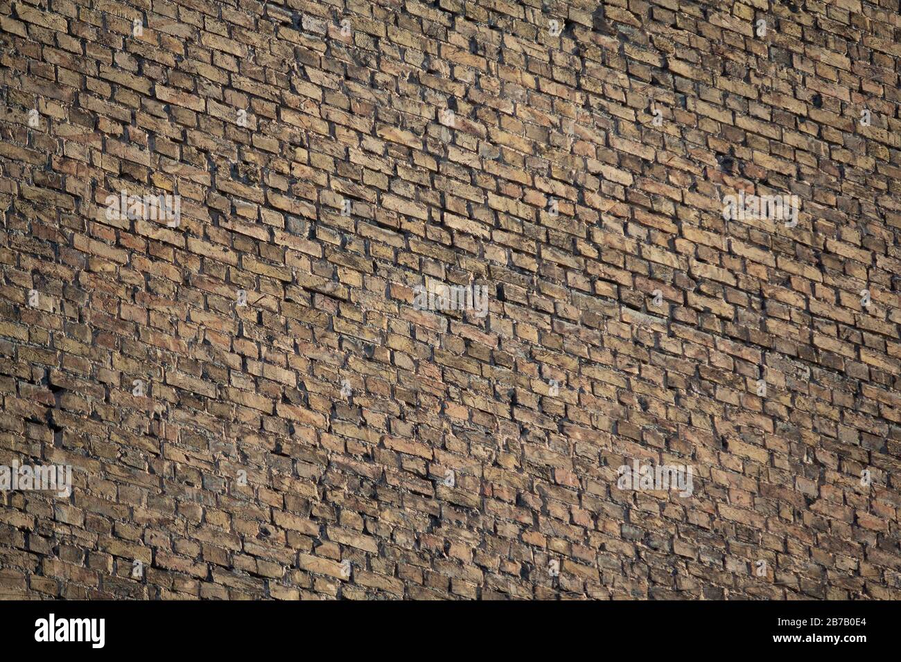 Old brick wall in a backgroun. Texture Stock Photo