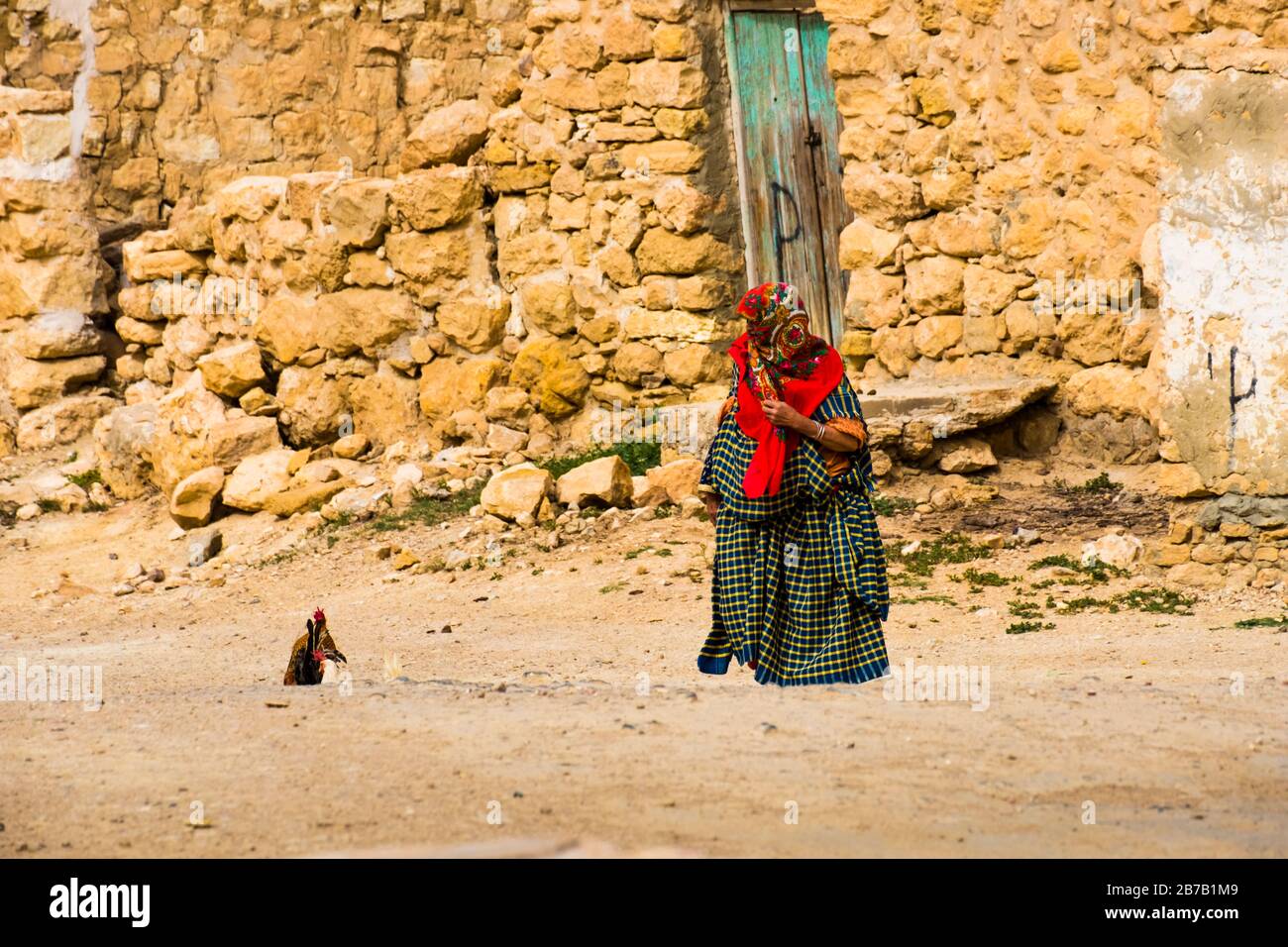 Berber woman in Chenini ruined village. Tunisia, Africa Stock Photo