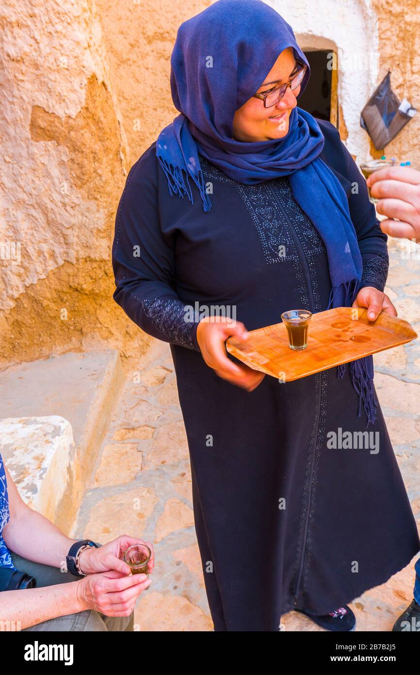 Berber women in a troglodye house. Matmata. Tunisia, Africa. Stock Photo