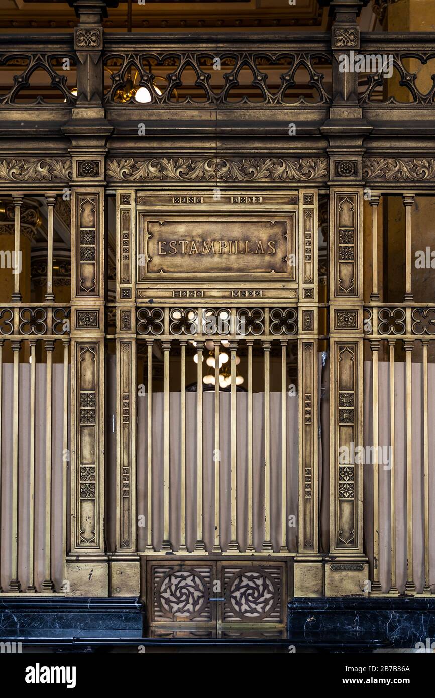 Mexico City main post office was built in 1907 and is comprised of many architectural styles including extensive use of ornate polished brass. Stock Photo