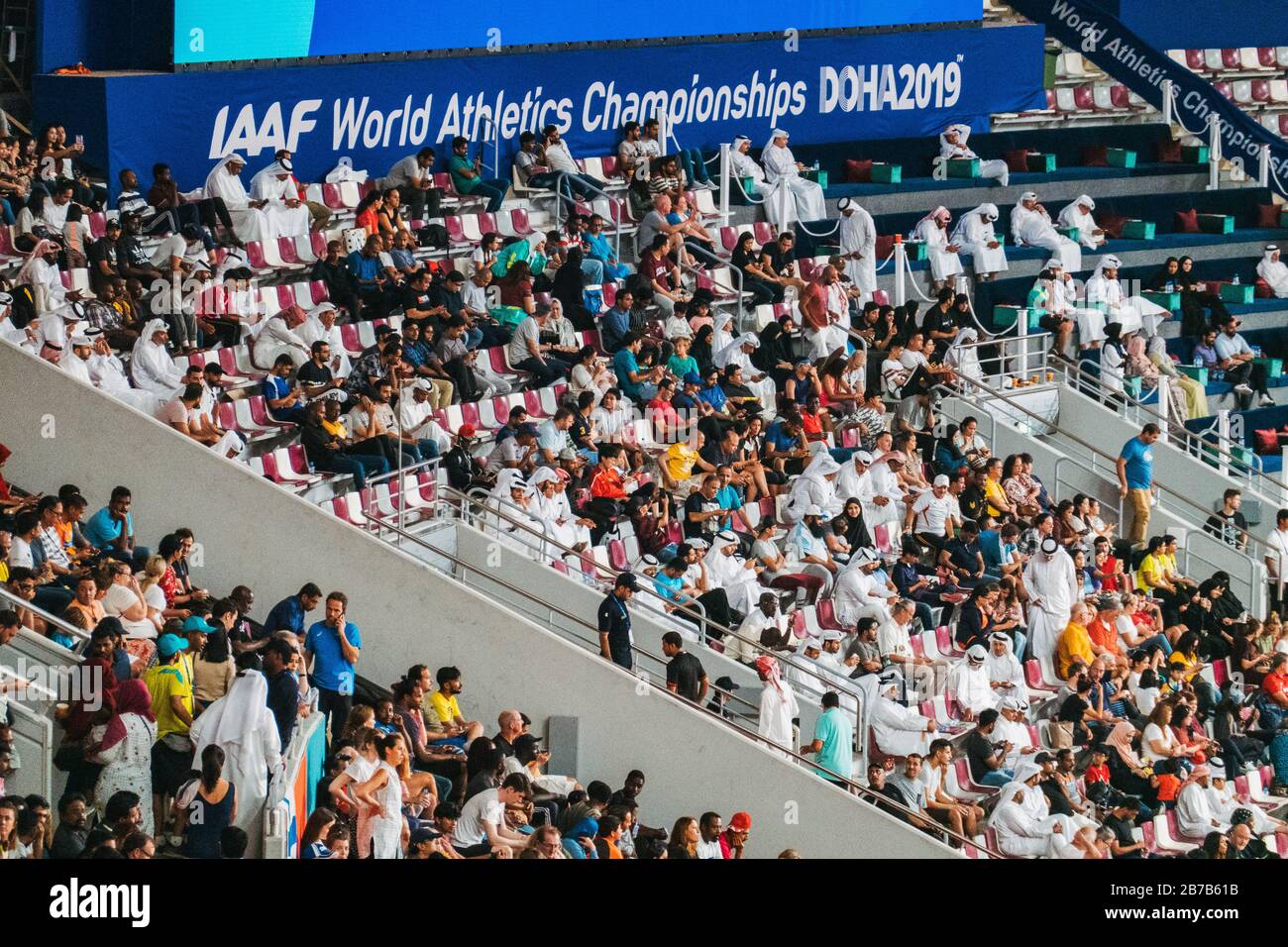Crowds of spectators watch events at the IAAF World Athletic Championships 2019 at Khalifa International Stadium, Doha, Qatar Stock Photo