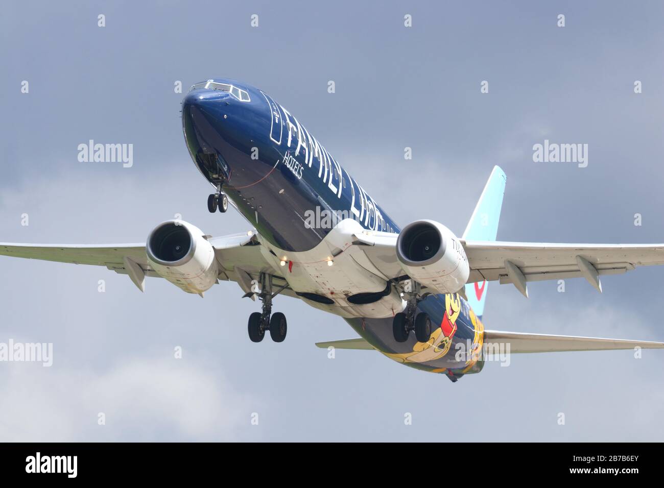A Boeing 737 in Family Life livery operated by Thompson airways, takes off from Leeds Bradford International Airport Stock Photo
