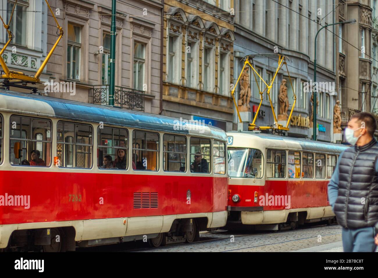Prague March 14, 2020 - Man wearing protective face mask on the streets of Prague during Corona virus covid-19 outbreak Stock Photo