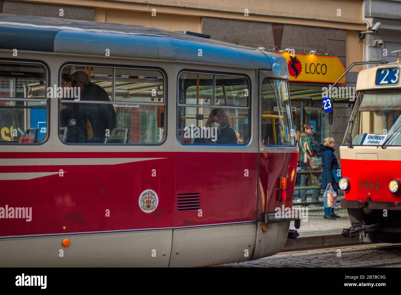 Prague March 14, 2020 - Woman wearing protective face mask on the streets of Prague during Corona virus covid-19 outbreak Stock Photo