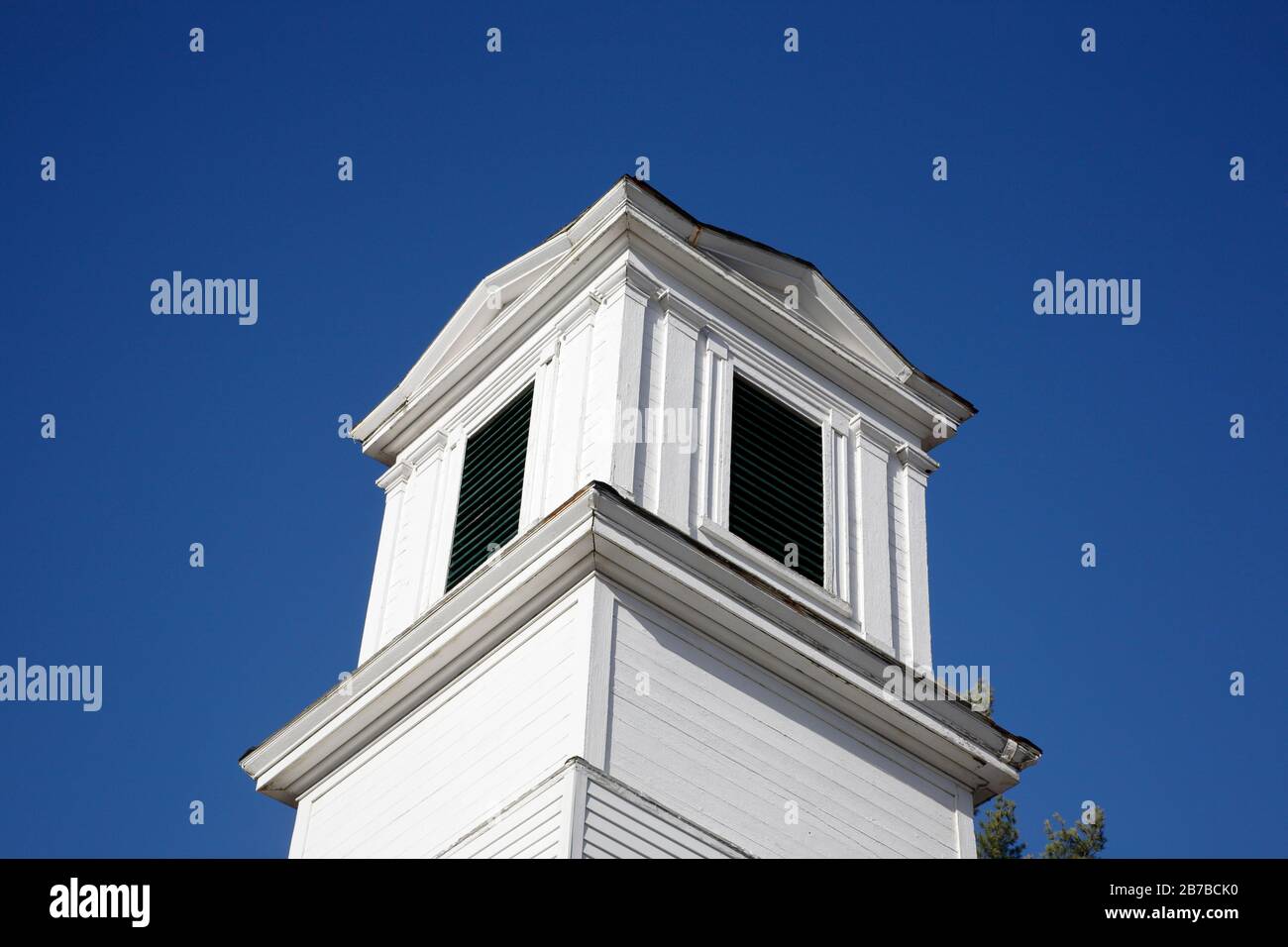 First Baptist Church of Gilmanton in Gilmanton, New Hampshire during the autumn months. Built in 1842, this Greek revival church is also known as the Stock Photo