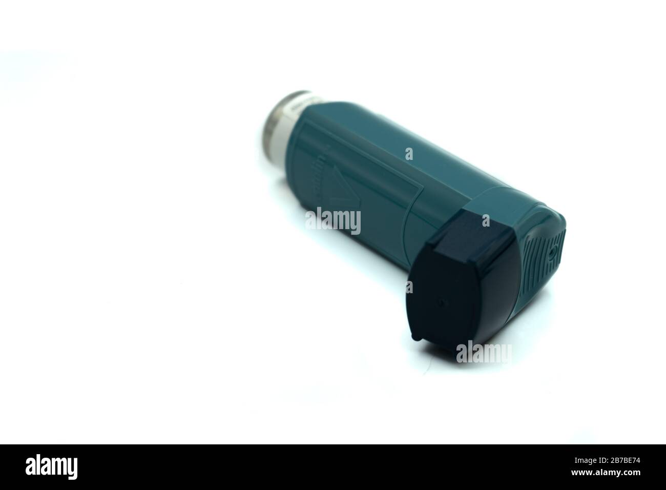 a Blue Ventolin asthma inhaler isolated on a white background Stock Photo
