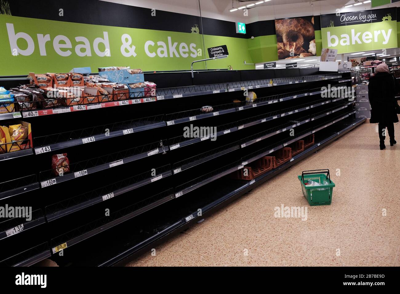 Empty shelves in the bakery aisles of an Asda store in London Stock