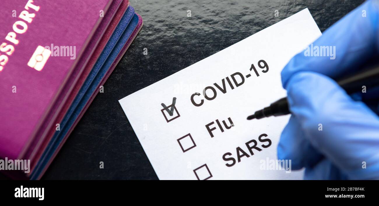 Coronavirus pandemic and travel concept, border passport control with COVID-19 coronavirus check and quarantine of tourists. Novel corona virus outbre Stock Photo