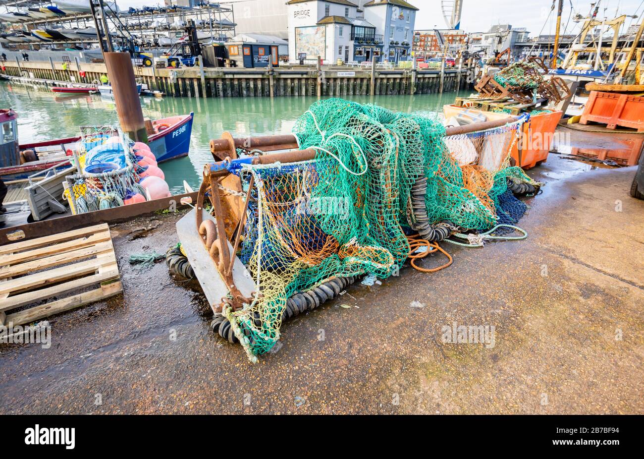 Fishing nets and tackle stored quayside at Camber Quay (The Camber