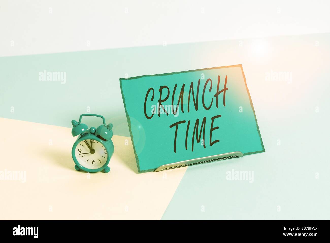 Conceptual Hand Writing Showing Crunch Time Concept Meaning Period When Pressure To Succeed Is Great Often Undertaking End Alarm Clock Beside A Paper Stock Photo Alamy