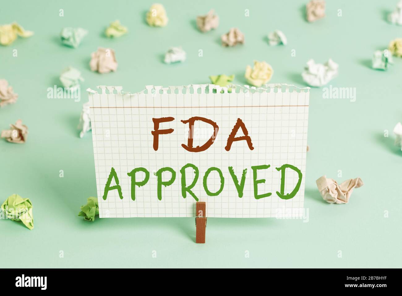 Word writing text Fda Approved. Business photo showcasing FDA agreed the product or formula is safe and or effective Colored crumpled rectangle shaped Stock Photo