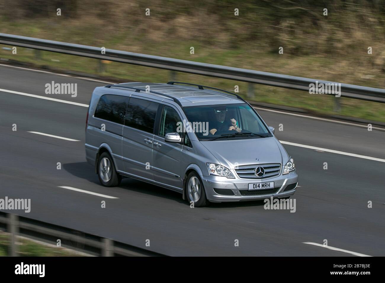 Mercedes-Benz Viano Ambiente 2.2 Cdi Blue-Cy Silver Diesel driving on the M6 motorway near Preston in Lancashire, UK Stock Photo