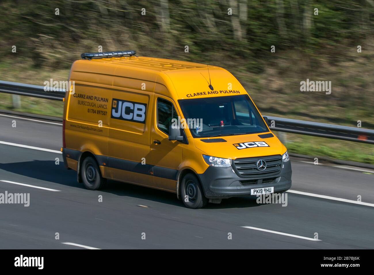 Clarke and Pulman JCB Mercedes-benz sprinter box van, commercial,vans,panel van, business vehicle on the M6 motorway near Preston in Lancashir Stock Photo