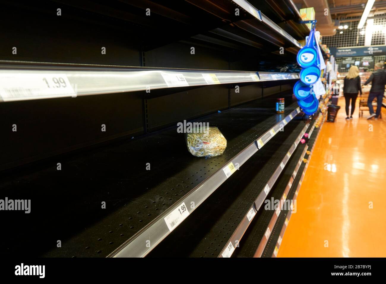 Vancouver, Canada, 14 March 2020 -- Grocery store shelves empty as shoppers stock up on essential food items during the COVID-19 (Coronavirus) pandemic. Stock Photo
