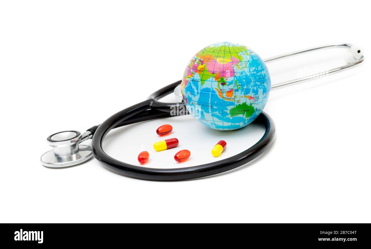 Sick polluted planet - A globe, stethoscope and medicine in tablet form. Stock Photo