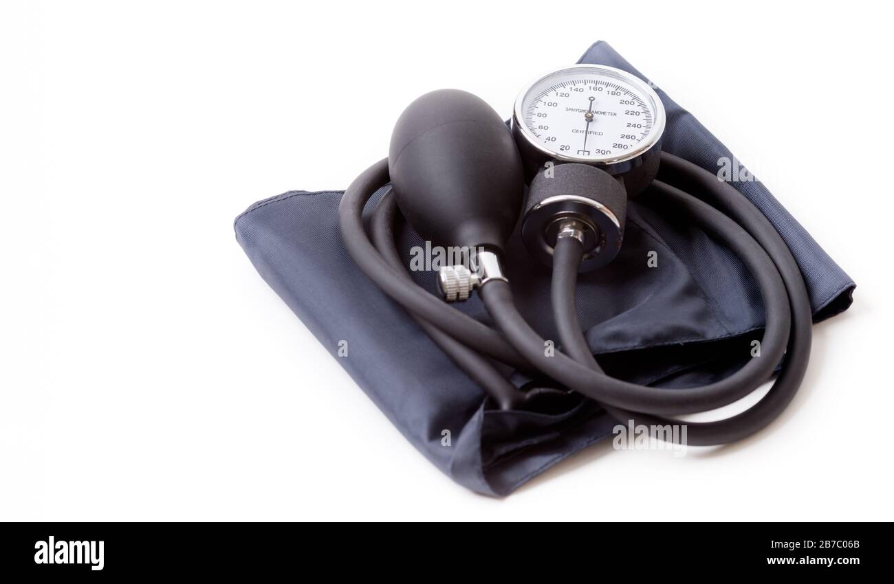 A sphygmomanometer (an instrument for measuring blood pressure) isolated on a white background with shadow. Stock Photo